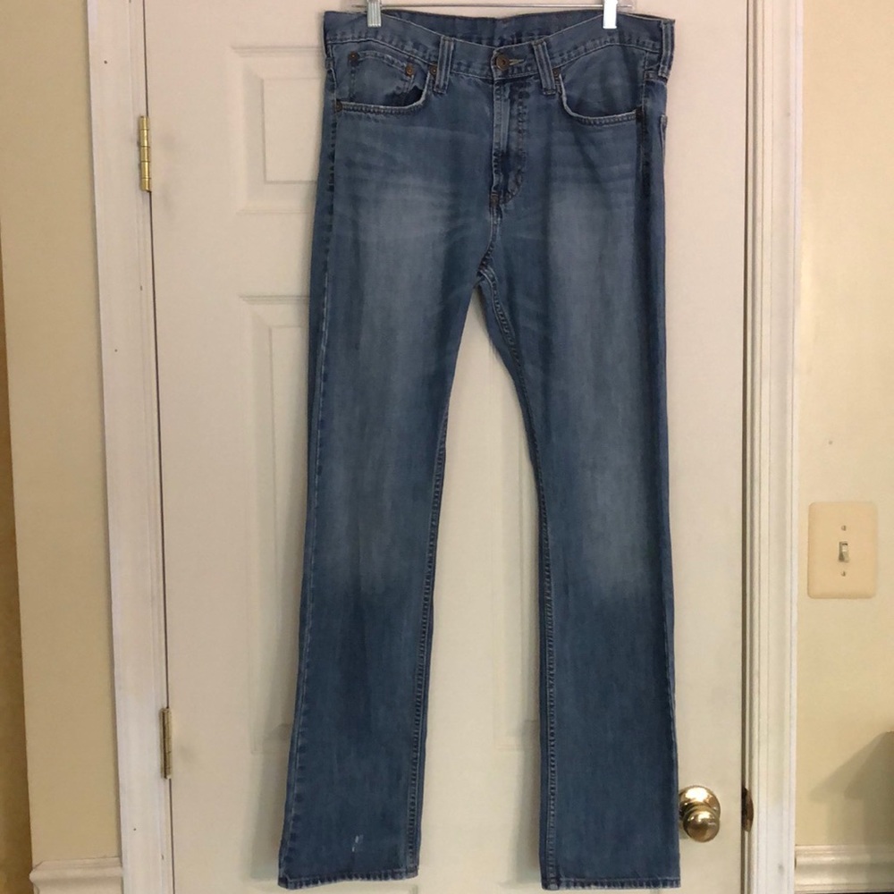 Well Loved BULLHEAD, GRAVELS,  light washed jeans.